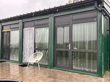 Glazed elevation of a converted 40 ft accommodation unit in Groningen