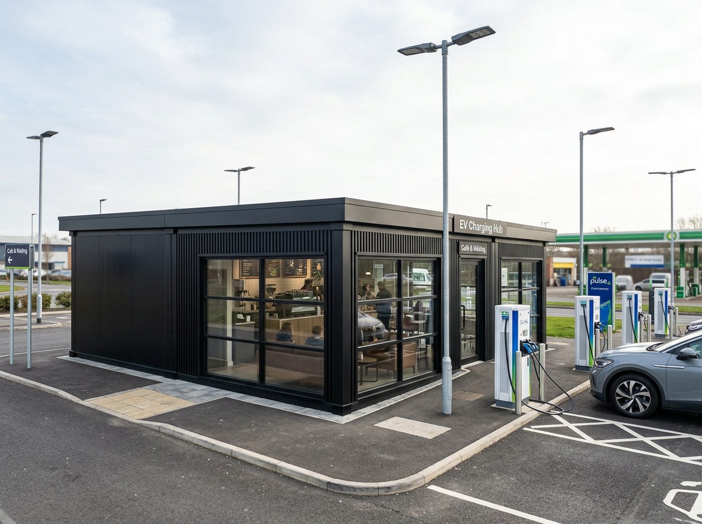 EV Charging Hub Buildings by Adacon UK. Modular amenity buildings for EV charging hubs and electric forecourts — waiting lounge, coffee and retail, accessible WC, staff and security rooms. — an example of what is possible for control rooms & switchrooms.